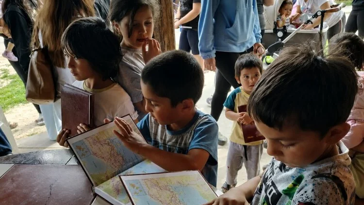 Chergash kids reading New Testament